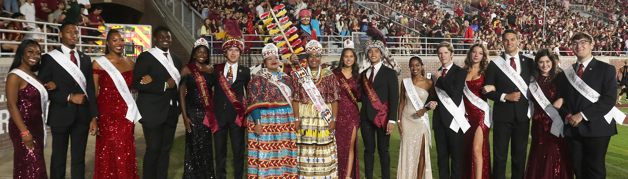 Image of Students lined up on a football field