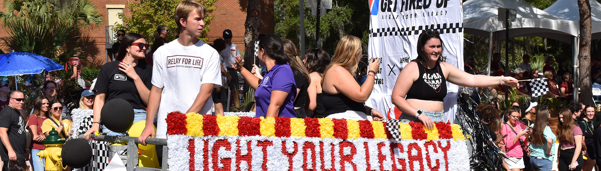 Image of students on a parade float