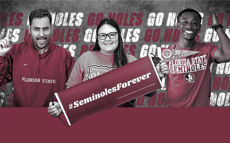 three students holding a banner that says '#SeminolesForever