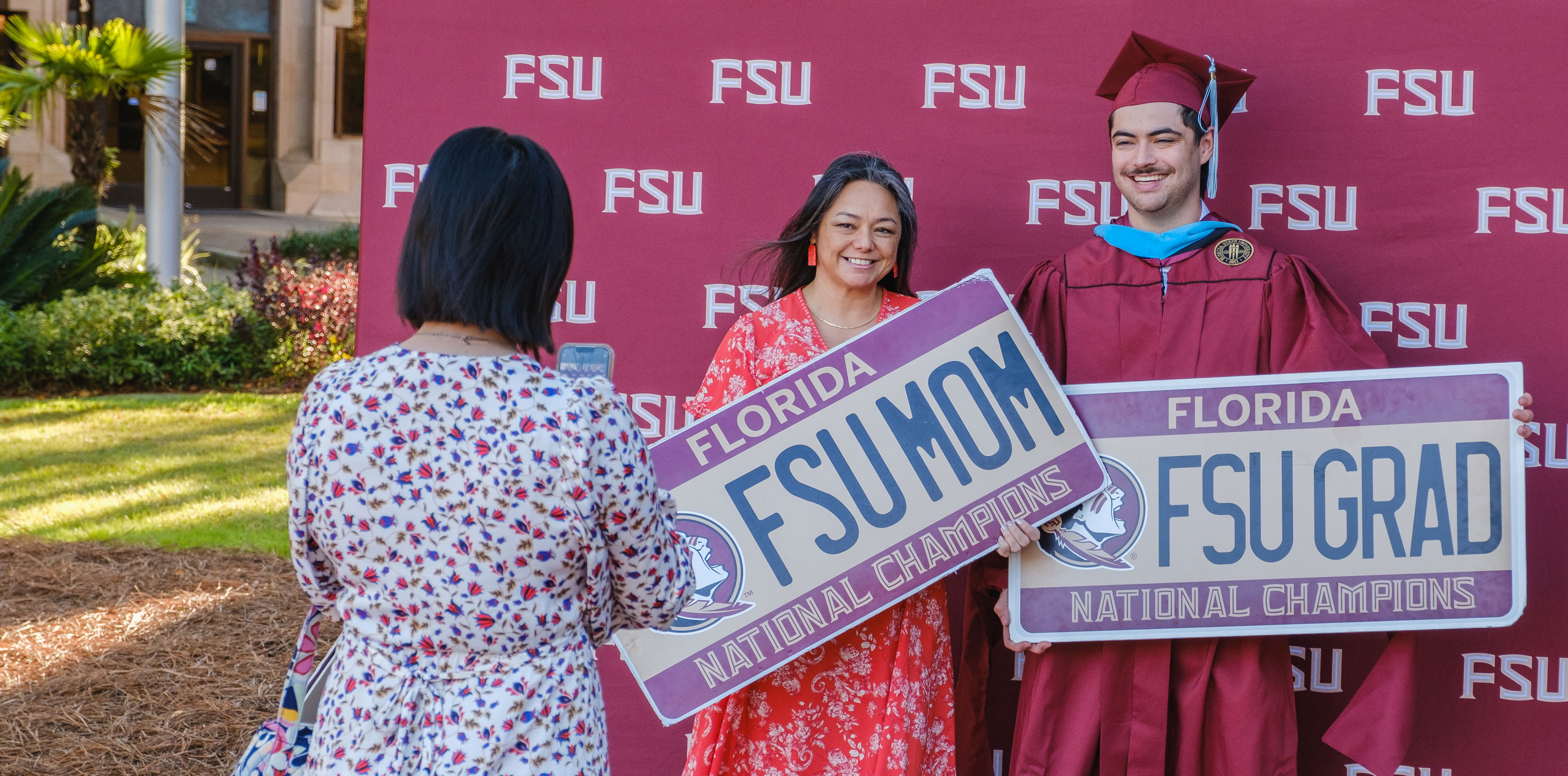 A Mom and Grad posing for a photo