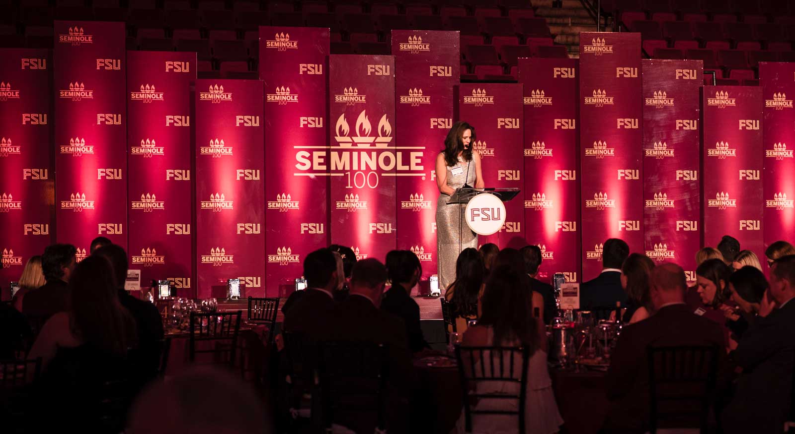 A photo of Marla Vickers on stage at the 2026 Seminole 100 Award ceremony.