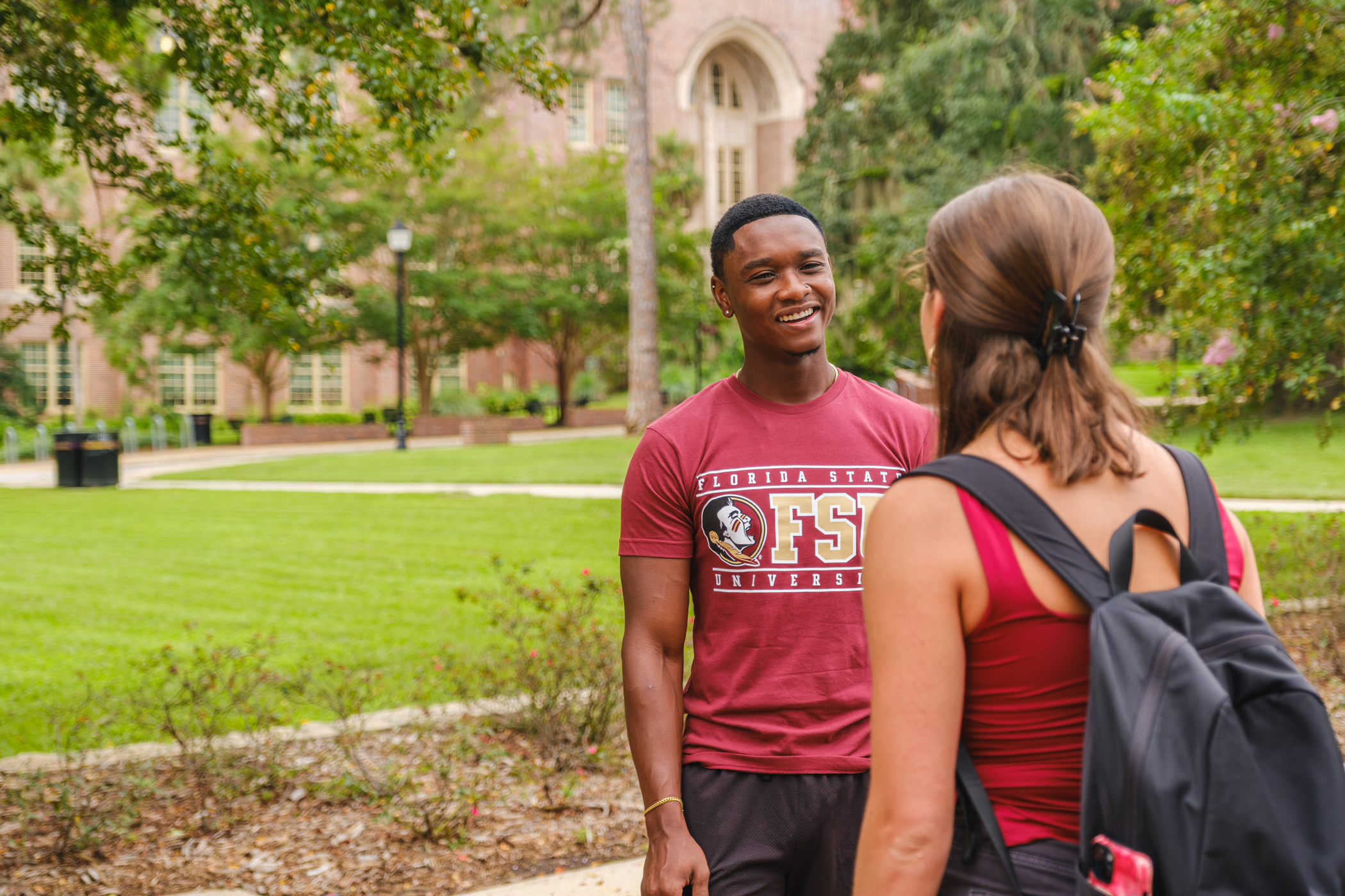 Two FSU students talking