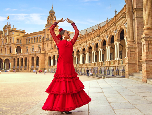 A photo of a Flamenco dancer dressed in red