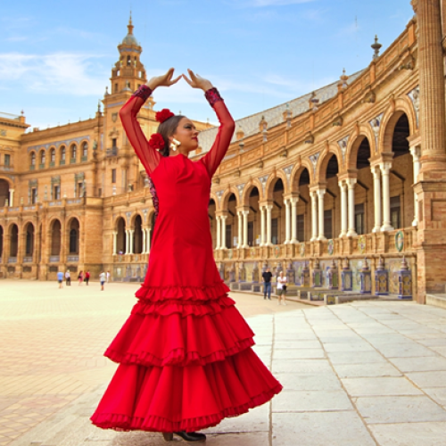 A photo of a Flamenco dancer dressed in red
