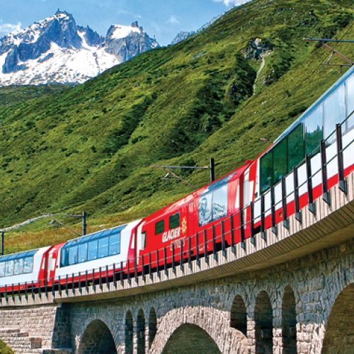 A photo of a train in the Alps